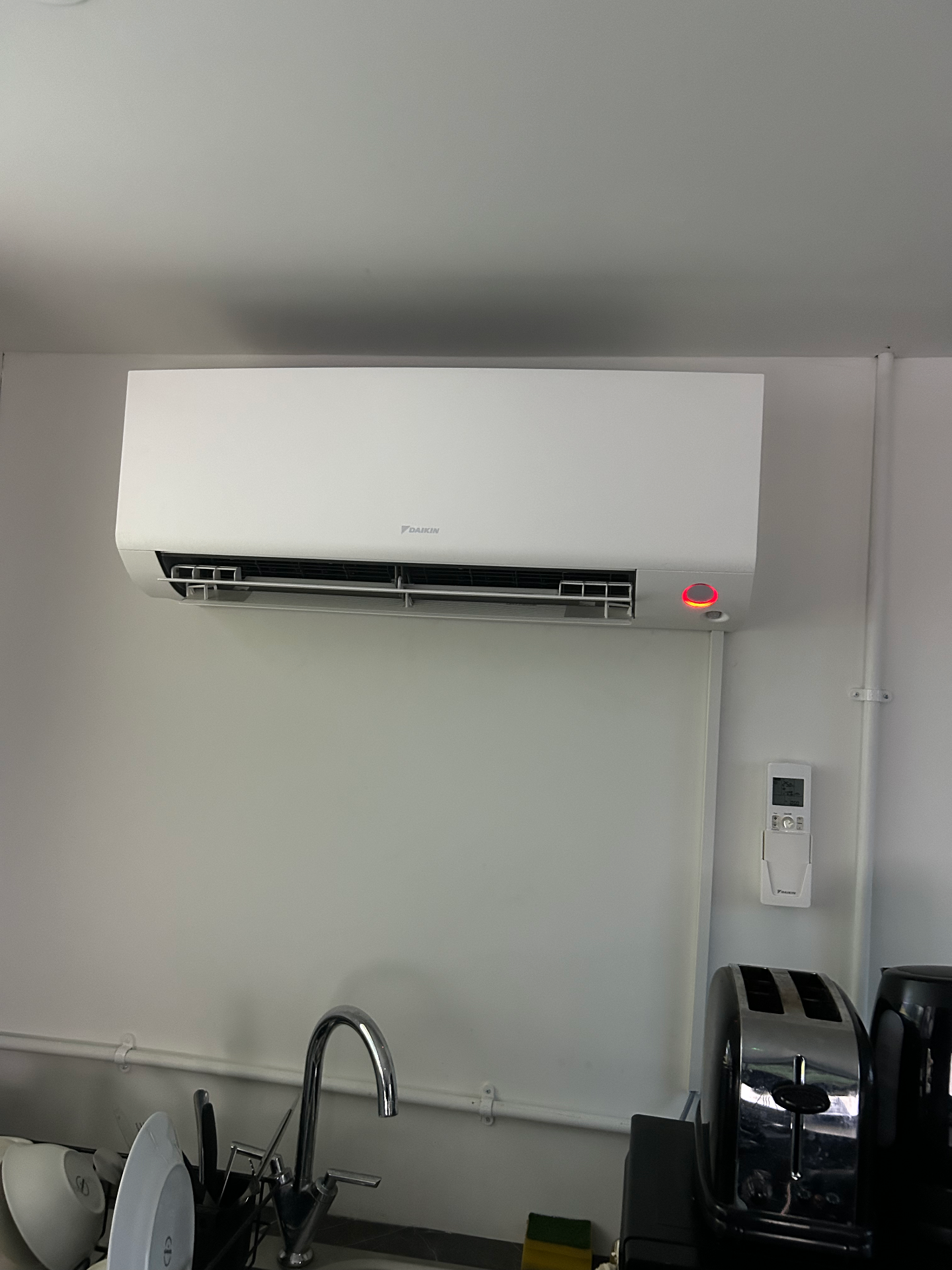 Daikin wall-mounted indoor air conditioning unit installed in a Battersea kitchen