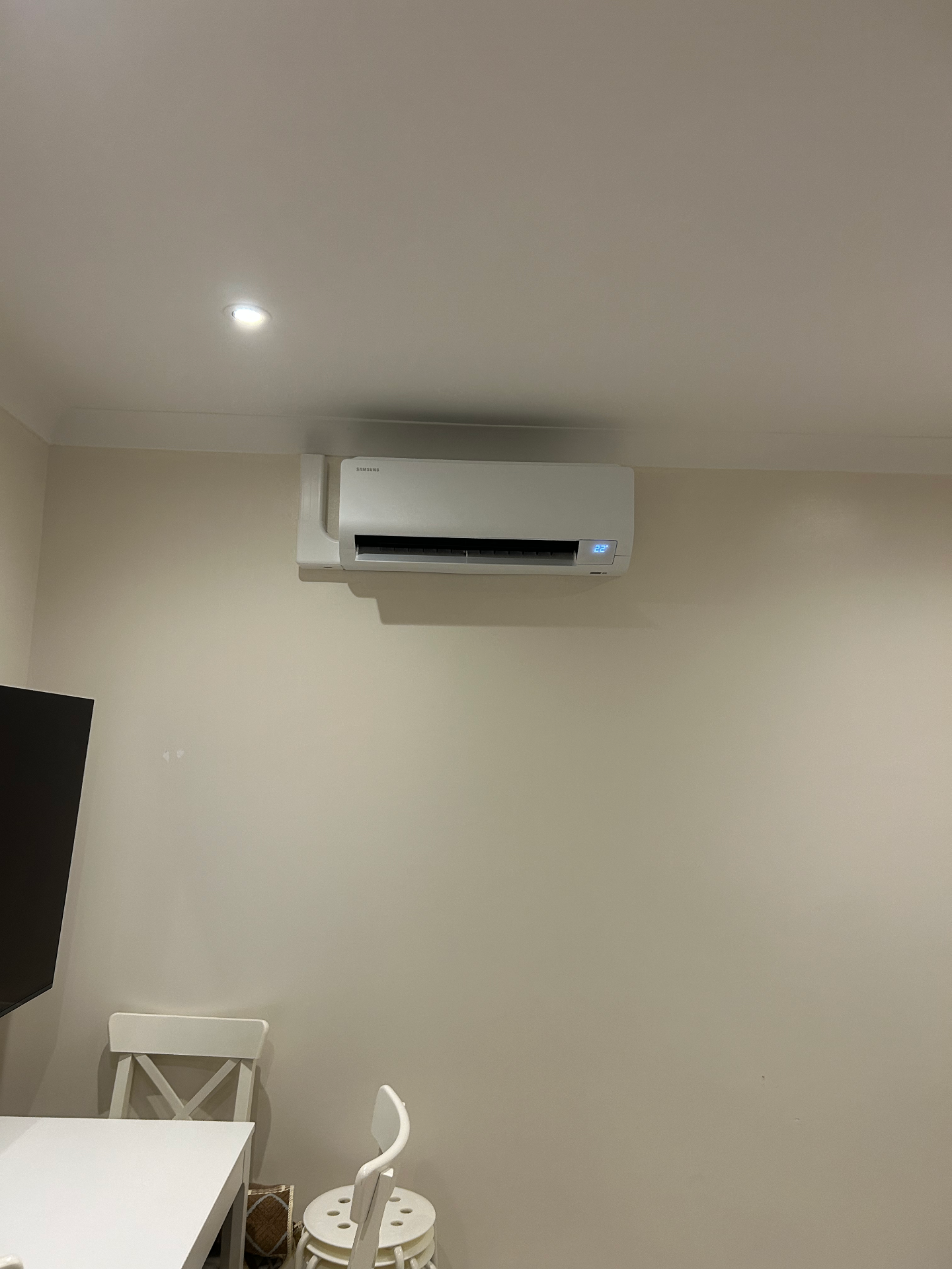Samsung wall-mounted AC unit in dining room